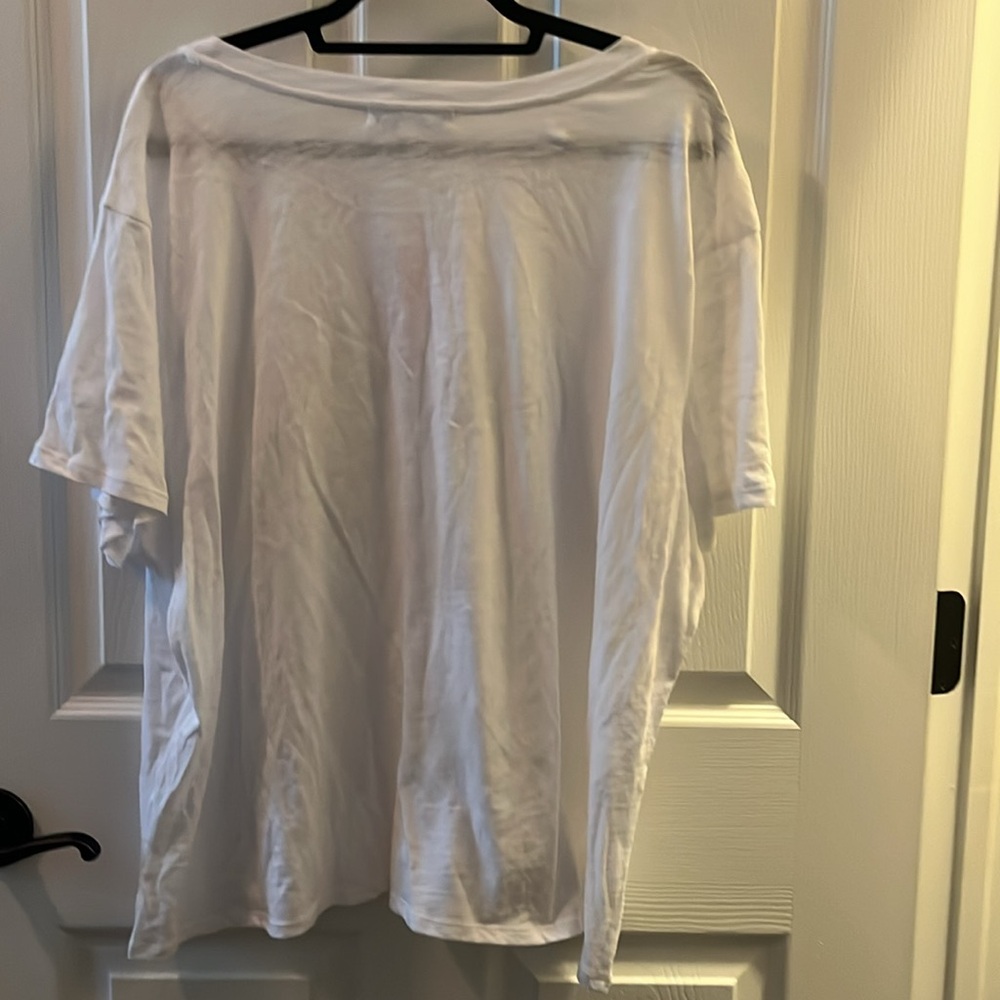 Plus size woman’s white T shirt with pocket. - Picture 3 of 6